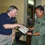 Mick presenting the Certificate of Appreciation to the 882 Regiment CO